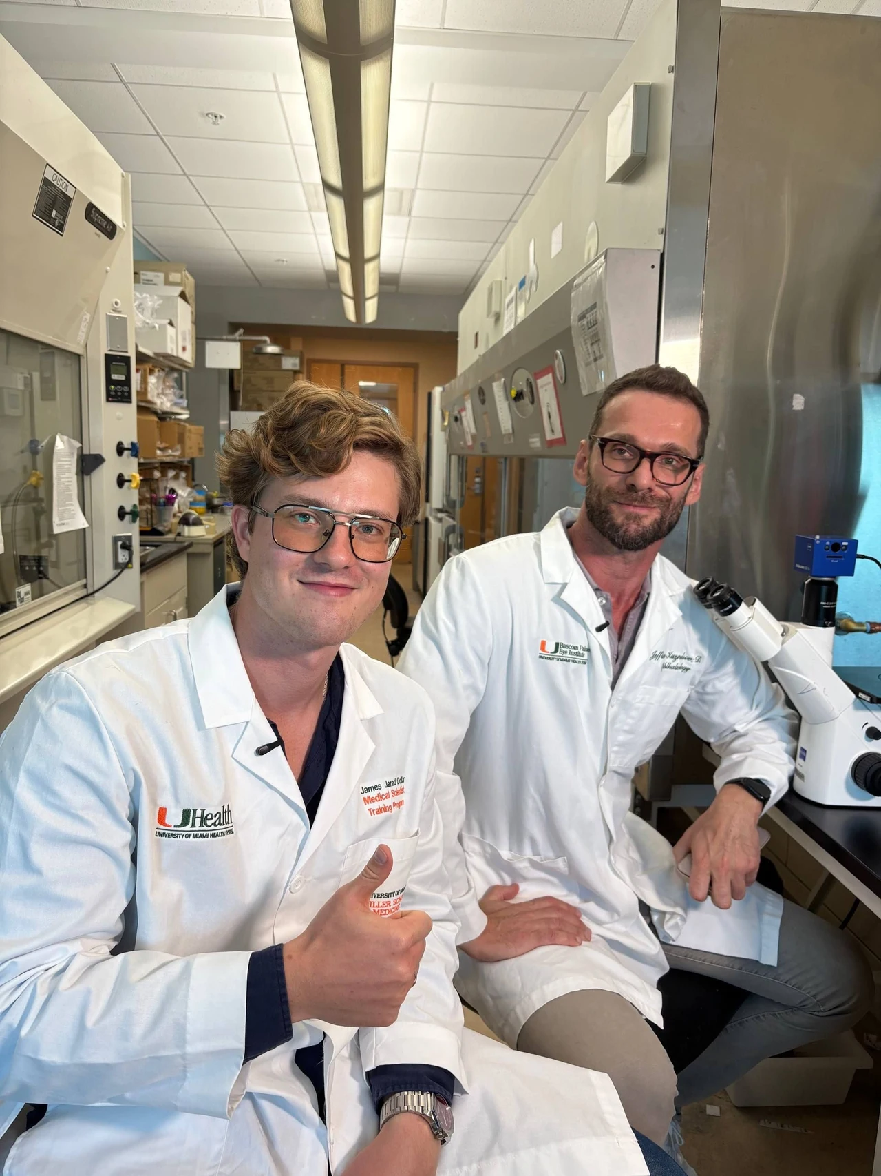 Maxim in the lab alongside a colleague